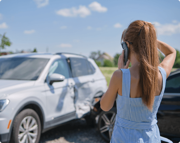 woman on the phone after a car accident